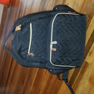 Fisher price diaper bag, with gold colored zippers.